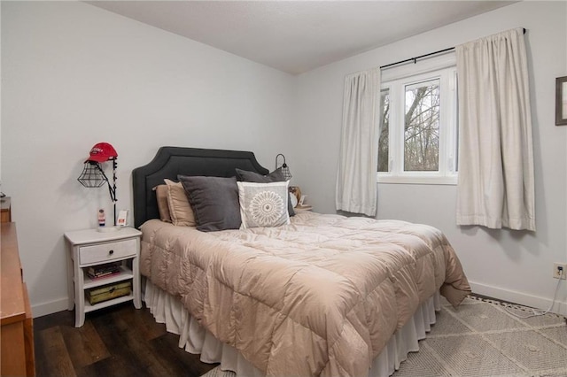 222 1st Ave, Clear Lake, WI 54005 - bedroom featuring baseboards and wood finished floors