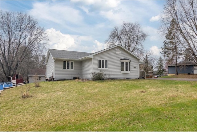 222 1st Ave, Clear Lake, WI 54005 - back of house with a lawn