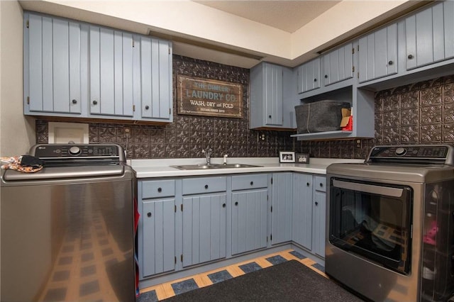 222 1st Ave, Clear Lake, WI 54005 - washroom with cabinet space, washer and dryer, and light floors