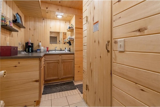 222 1st Ave, Clear Lake, WI 54005 - bathroom with wood walls, wooden ceiling, vanity, and tile patterned flooring