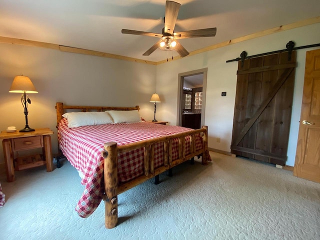 8001 Waschbisch Rd, Oconto Falls, WI 54154 - carpeted bedroom with a barn door, a ceiling fan, and ensuite bath