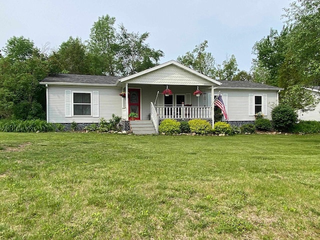 8001 Waschbisch Rd, Oconto Falls, WI 54154 - view of front of house featuring a porch and a front lawn