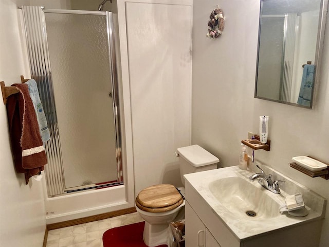 16651 Dolittle Ln, Townsend, WI 54175 - full bath featuring a shower with door, vanity, and toilet