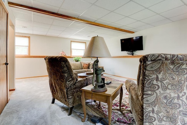 N5071 Deer Trl, Marinette, WI 54143 - living area with plenty of natural light, carpet, a paneled ceiling, and baseboards