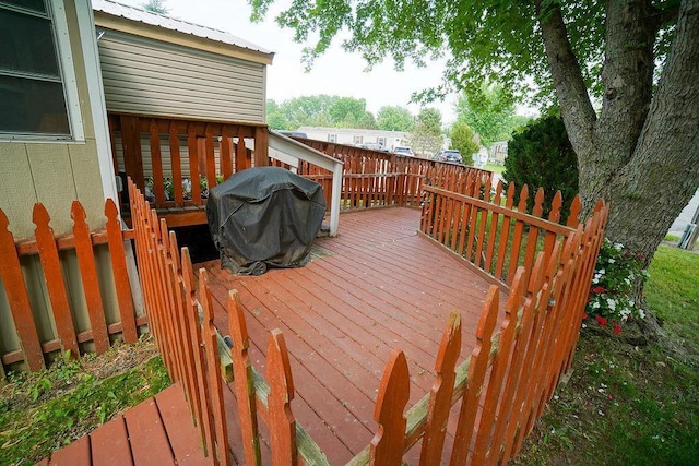 134 Attewell St Unit 54, Mauston, WI 53948 - wooden terrace featuring grilling area