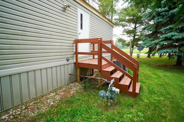 134 Attewell St Unit 54, Mauston, WI 53948 - deck with a lawn