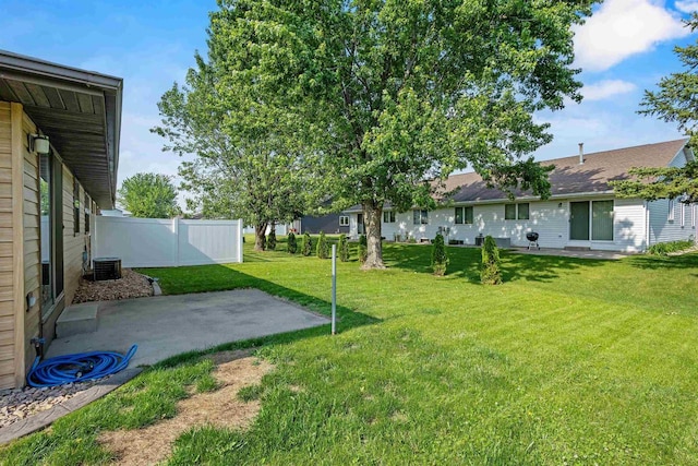3610 N Terri Ln, Appleton, WI 54914 - view of yard featuring a patio and central AC unit