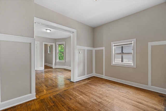 1718 W Washington St Unit 1720, Milwaukee, WI 53204 - unfurnished room with hardwood / wood-style floors and baseboards