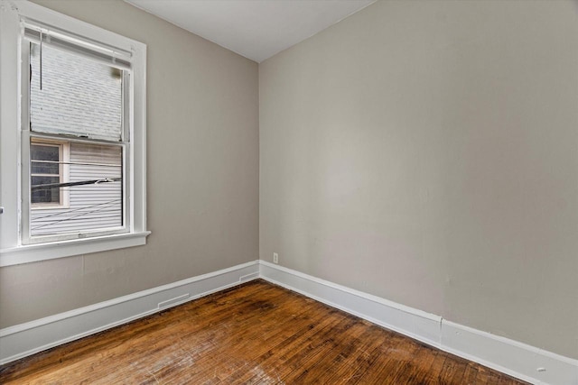 1718 W Washington St Unit 1720, Milwaukee, WI 53204 - spare room with hardwood / wood-style floors, baseboards, and healthy amount of natural light