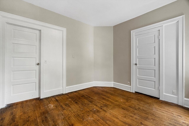 1718 W Washington St Unit 1720, Milwaukee, WI 53204 - empty room featuring dark wood-type flooring and baseboards