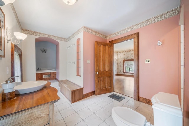 4760 State Rd 91, Oshkosh, WI 54904 - bathroom with baseboards, toilet, tile patterned floors, and vanity