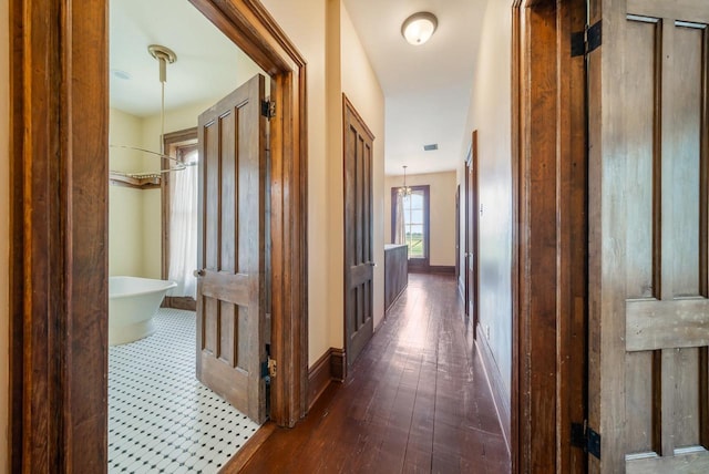 4760 State Rd 91, Oshkosh, WI 54904 - corridor with baseboards and dark wood-style floors