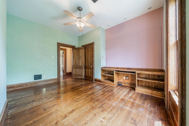 4760 State Rd 91, Oshkosh, WI 54904 - unfurnished bedroom with hardwood / wood-style floors and ceiling fan