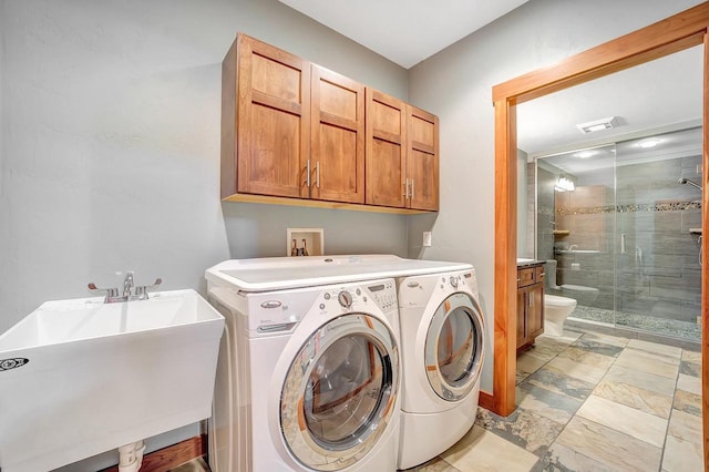 3857 Lake Lucerne Dr, Crandon, WI 54520 - laundry room featuring cabinet space and washing machine and clothes dryer