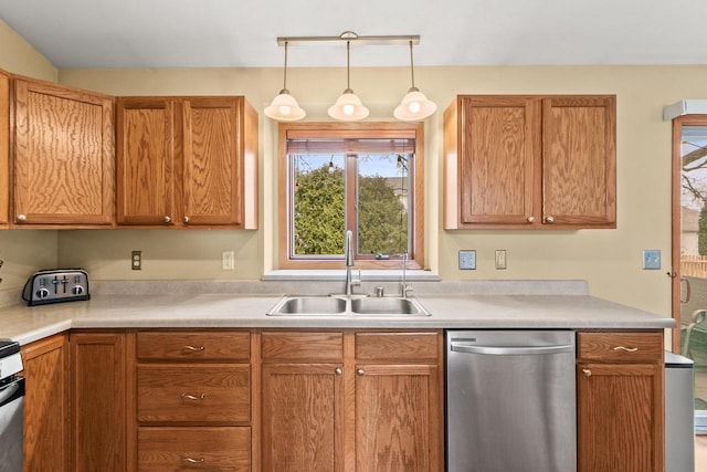 7338 Blue Maple Trl, Madison, WI 53719 - kitchen featuring stainless steel dishwasher, a sink, and light countertops