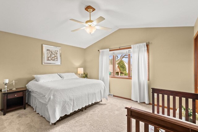 7338 Blue Maple Trl, Madison, WI 53719 - bedroom with lofted ceiling, light colored carpet, baseboards, and ceiling fan