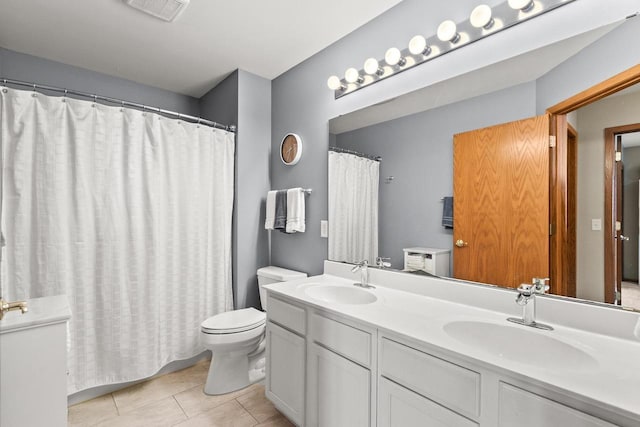 7338 Blue Maple Trl, Madison, WI 53719 - bathroom with toilet, double vanity, tile patterned floors, and curtained shower