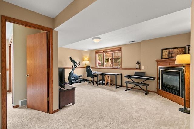 7338 Blue Maple Trl, Madison, WI 53719 - workout area with carpet, a glass covered fireplace, and baseboards