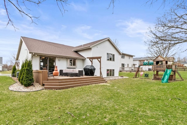 7338 Blue Maple Trl, Madison, WI 53719 - back of property featuring outdoor lounge area, a playground, a deck, and a yard
