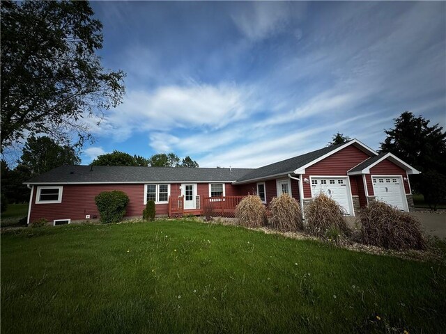 1311 W Northstar Ln, Eau Claire, WI 54703 - ranch-style home with an attached garage, a front yard, concrete driveway, and a deck