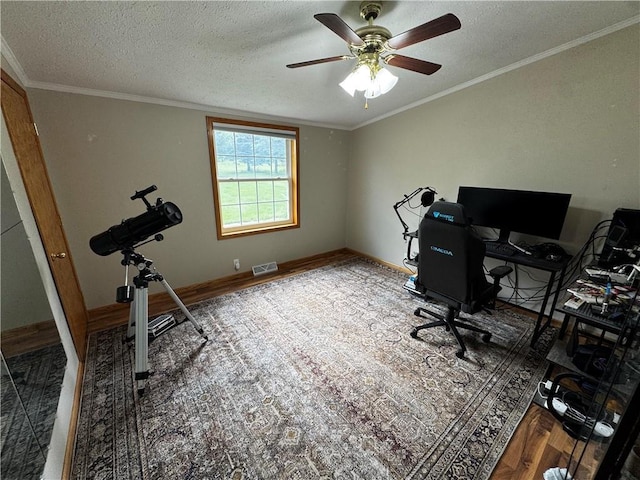 1311 W Northstar Ln, Eau Claire, WI 54703 - office space with wood finished floors, a textured ceiling, a ceiling fan, crown molding, and baseboards