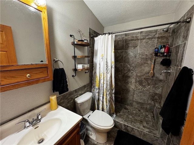 1311 W Northstar Ln, Eau Claire, WI 54703 - full bathroom featuring a textured ceiling, toilet, vanity, and a tile shower