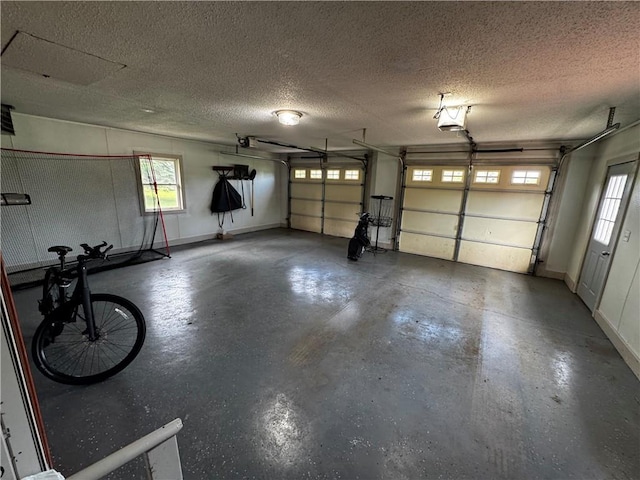 1311 W Northstar Ln, Eau Claire, WI 54703 - garage with a garage door opener and baseboards