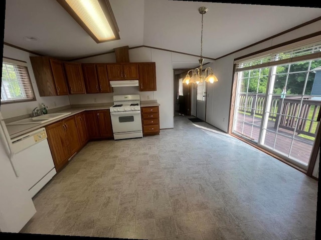 N2639 County Road Z Unit B19, Dousman, WI 53118 - kitchen with white appliances, a chandelier, under cabinet range hood, vaulted ceiling, and light countertops