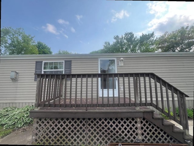 N2639 County Road Z Unit B19, Dousman, WI 53118 - rear view of property with a deck
