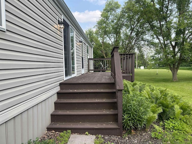 N2639 County Road Z Unit B19, Dousman, WI 53118 - deck with a yard