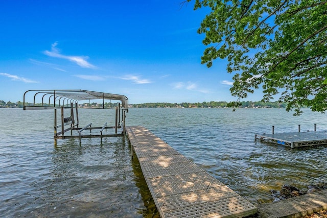 W347N6122 Rd I, Oconomowoc, WI 53066 - dock area featuring boat lift and a water view