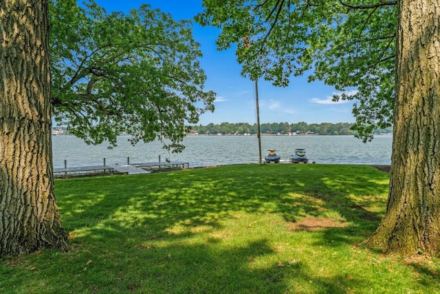 W347N6122 Rd I, Oconomowoc, WI 53066 - view of grassy yard featuring a water view and a dock