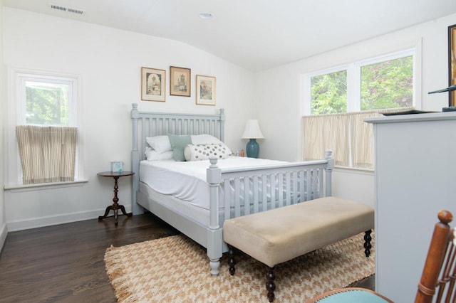 W347N6122 Rd I, Oconomowoc, WI 53066 - bedroom featuring vaulted ceiling, wood finished floors, and baseboards