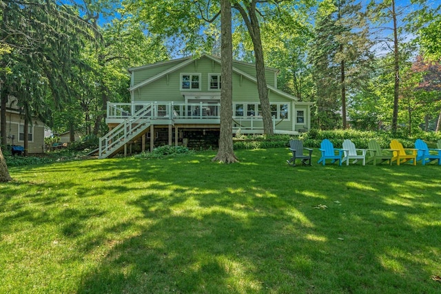 W347N6122 Rd I, Oconomowoc, WI 53066 - rear view of property with stairs, a deck, and a lawn
