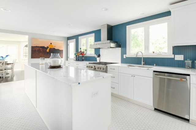 W347N6122 Rd I, Oconomowoc, WI 53066 - kitchen with stainless steel appliances, wall chimney range hood, a sink, a center island, and white cabinets