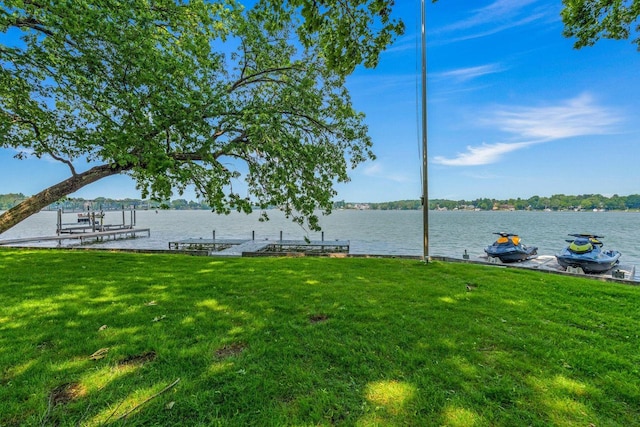 W347N6122 Rd I, Oconomowoc, WI 53066 - dock area featuring a lawn and a water view