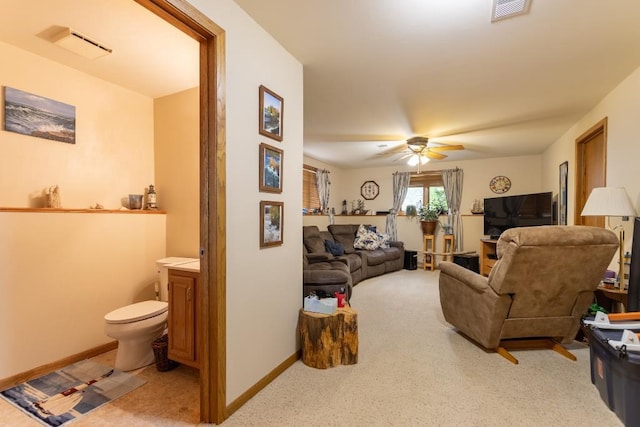 1207 Lark St, Merrill, WI 54452 - living room featuring light carpet, ceiling fan, and baseboards
