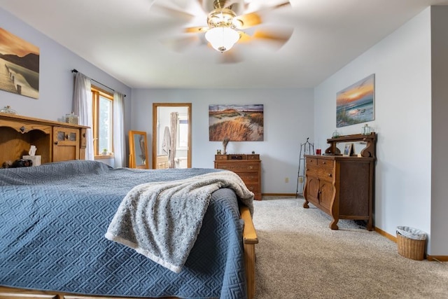 1207 Lark St, Merrill, WI 54452 - bedroom featuring baseboards, carpet, ceiling fan, and ensuite bathroom