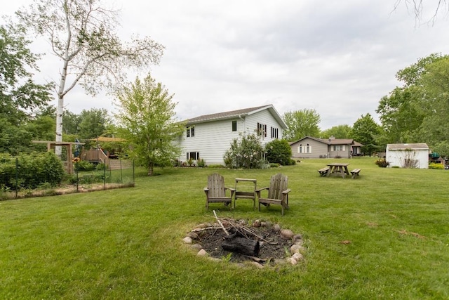 1207 Lark St, Merrill, WI 54452 - view of green lawn featuring a fire pit