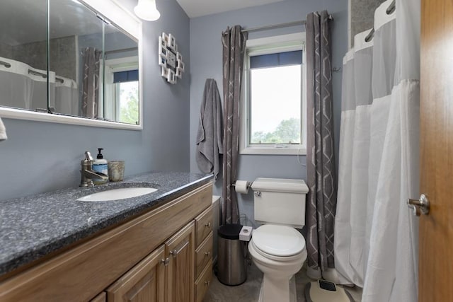 1207 Lark St, Merrill, WI 54452 - bathroom with vanity, curtained shower, and toilet