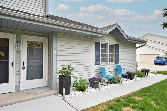 724 Worthington Ct Unit 3-A, West Bend, WI 53090 - view of exterior entry featuring covered porch
