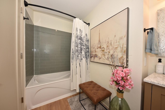724 Worthington Ct Unit 3-A, West Bend, WI 53090 - bathroom with wood finished floors, shower / tub combo, and vanity