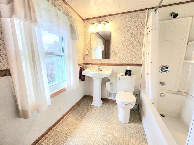 5609 Two Creeks Rd, Two Rivers, WI 54241 - full bathroom with toilet, wallpapered walls, shower / tub combo, baseboards, and a sink