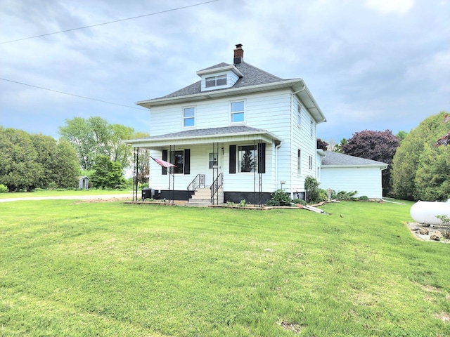 5609 Two Creeks Rd, Two Rivers, WI 54241 - traditional style home featuring covered porch, a front lawn, a chimney, and roof with shingles