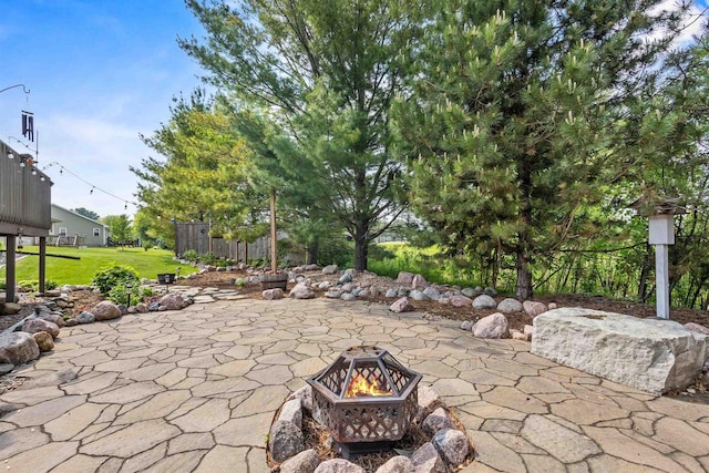 831 Browning Dr, Seymour, WI 54165 - view of patio with a fire pit