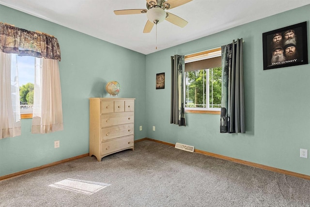 831 Browning Dr, Seymour, WI 54165 - carpeted bedroom featuring baseboards and a ceiling fan