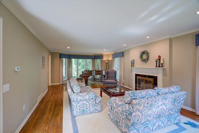 101 Everglade Dr, Madison, WI 53717 - living area featuring crown molding, wood finished floors, baseboards, a fireplace, and recessed lighting