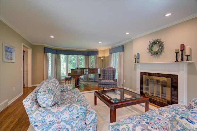 101 Everglade Dr, Madison, WI 53717 - living room with ornamental molding, wood finished floors, a fireplace with flush hearth, baseboards, and recessed lighting