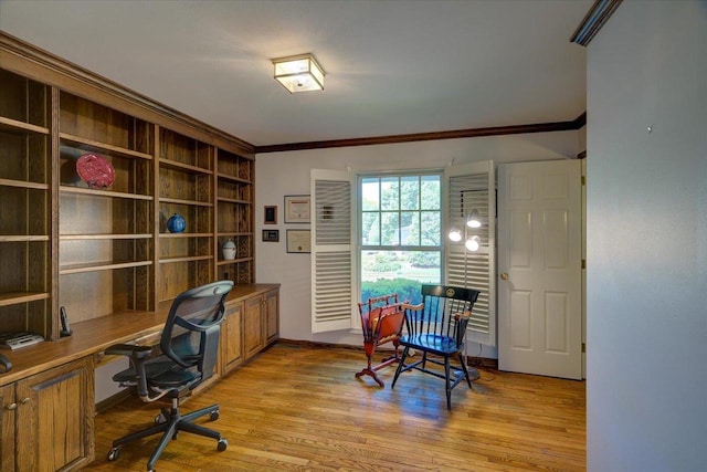 101 Everglade Dr, Madison, WI 53717 - home office with crown molding, light wood-style flooring, built in desk, and baseboards