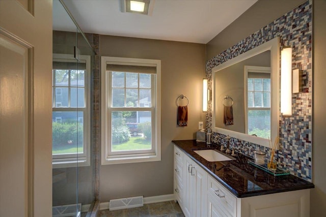 101 Everglade Dr, Madison, WI 53717 - full bath with healthy amount of natural light, vanity, baseboards, and a stall shower